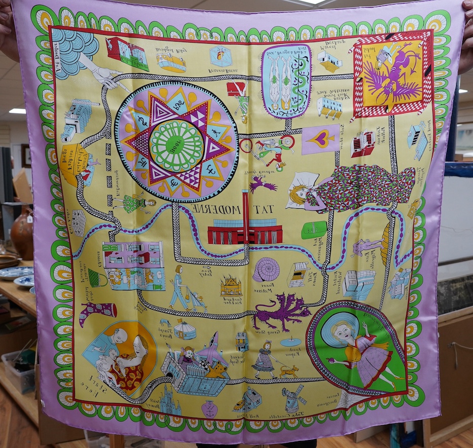 Grayson Perry, silk scarf, in original black Tate box and cellophane cover, scarf 90cm x 90cm. Condition - the interior black tissue paper seal has torn, the scarf looks to be in good condition, black Tate box good, yell